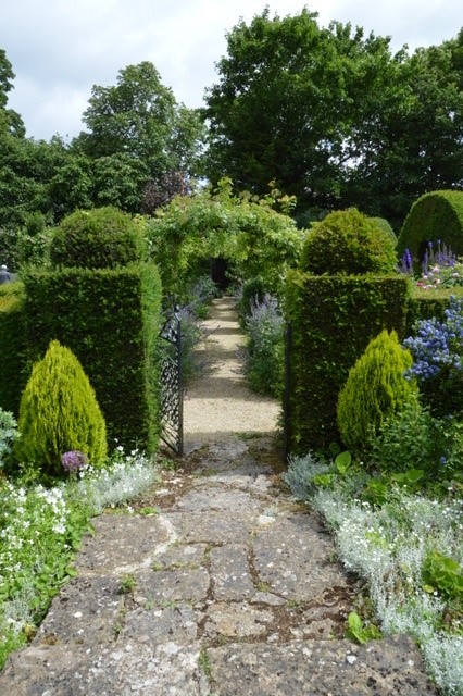 entrance gate to lush garden